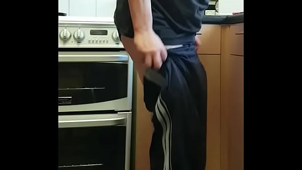 looking out my kitchen window when my girlfriend pulled down my pants and started fucking my asshole with a strap-on dildo